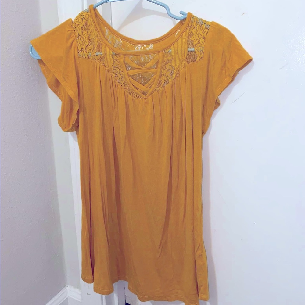 Fall color shirt.